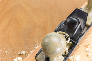 Carpenter plane and wood shavings