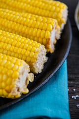 Homemade golden corn cob with butter and salt