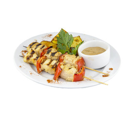 Chicken skewers with potatoes and sauce