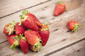Strawberries on a rustic table