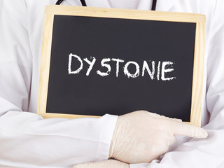 Doctor shows information on blackboard: Dystonia in german