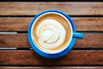 Top view of coffee art on a wooden background