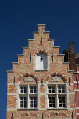 Fototapeta na wymiar The brick historic house (Bruges, Belgium)