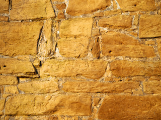 Schäden an Sandsteinwand