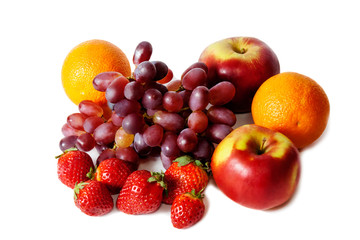 Fototapeta na wymiar Fresh fruits and berries isolated on white