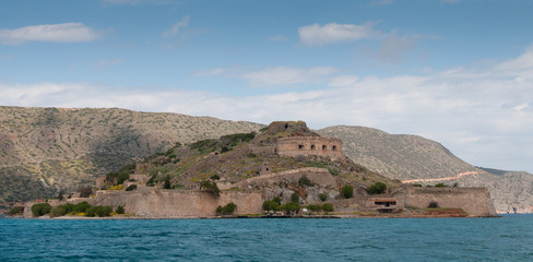 Fototapeta na wymiar Island of Spinalonga in the Gulf of Elounda town in Crete, Gre