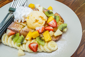 Honey toast with mix fruit.