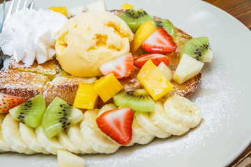 Honey toast with mix fruit.