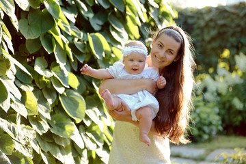 Mother and little daughter in the park