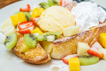 Honey toast with mix fruit.