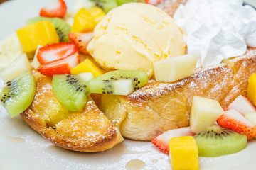 Honey toast with mix fruit.