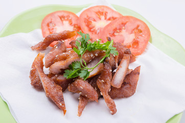 fried pork with white sesame seeds