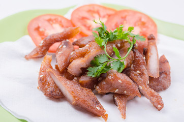 fried pork with white sesame seeds