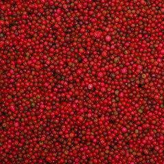 Red sprinkles background