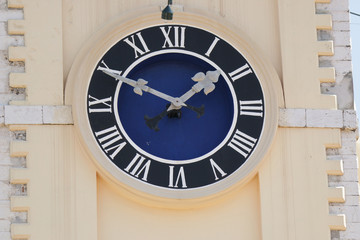 Fototapeta na wymiar The clock on the town hall in Corfu. Greece.
