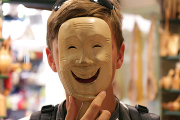 A man in a mask with a smile