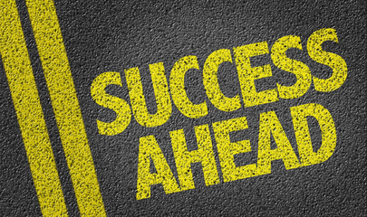 Success Ahead written on the road