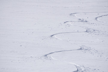 Tracks on a mountain Slope, freeride in deep snow