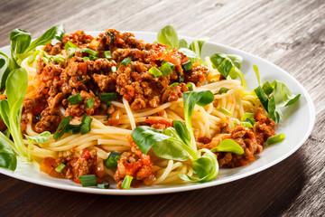 Pasta with meat, tomato sauce and vegetables