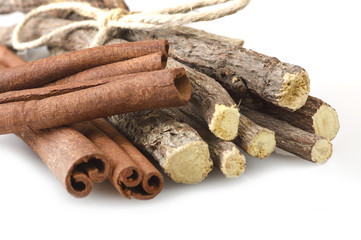 Cinnamon stick and Liqorice on the white