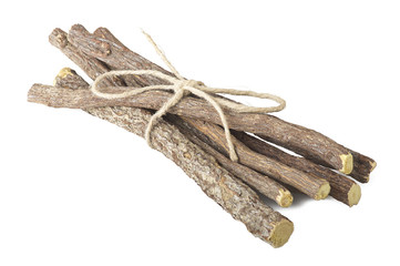 Licorice roots close up on the white