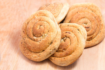 Four wholemeal buns with onions