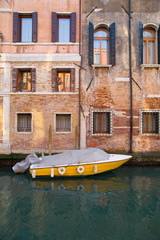 An old building and a boat in Venice
