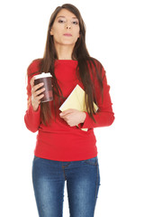 Young woman with coffee and notebook.