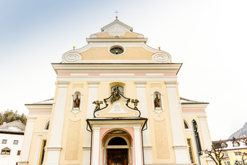 Facade of Catholic Parish Church in Dolomites