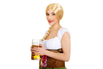 Beautiful bavarian woman with beer.