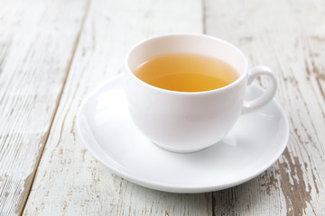 Cup of tea on white wooden