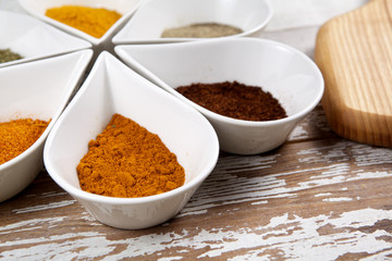 Spices on wooden background
