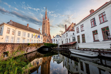 little dock and bridge in a canal of Bruges, Belgium