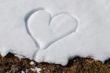 Fototapeta premium heart drawn in the snow