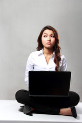 Businesswoman working thinking something