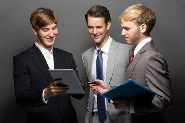Group of business man with tablet
