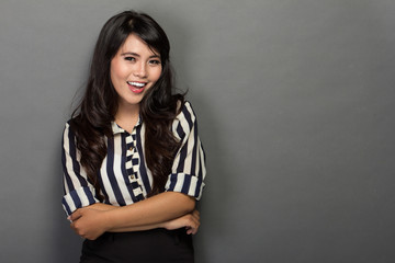 Fototapeta premium Happy young woman in work suit, smile.