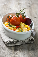 roasted vegetables in a white dish