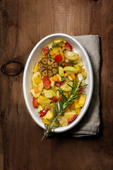roasted vegetables in a white dish