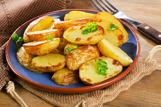 Fried potato with a fresh herb.