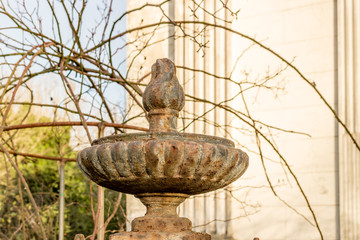 Old fountain in front to Italian XVII Century church