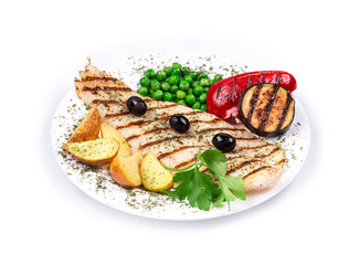 Grilled fish fillet with tasty vegetables.