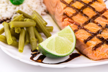 Roasted salmon fillets with rice.