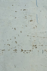Peeling paint on concrete wall