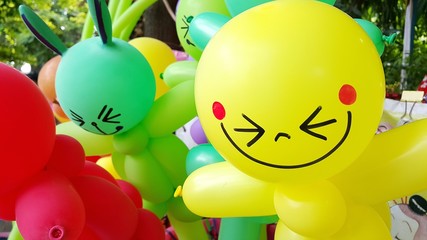Fototapeta na wymiar colorful balloons with smile face