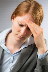 Fototapeta premium Tired Businesswoman at Work