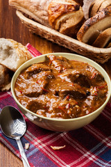 Beef stew served with crusty bread