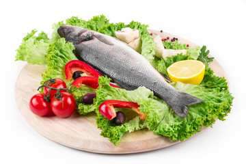 Composition of fresh seabass and vegetables.