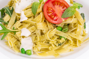Spaghetti with tomato basil and cheese.