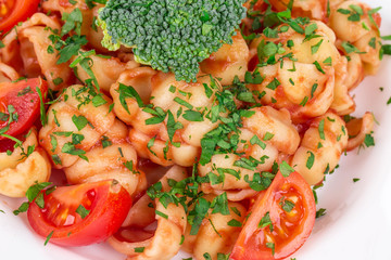 Spaghetti with tomato and basil.